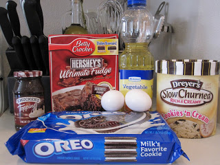 Oreo Stuffed Brownies are gooey, rich brownies filled with fudge, Oreos, and ice cream. Life-in-the-Lofthouse.com