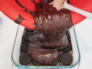 Oreo Stuffed Brownies are gooey, rich brownies filled with fudge, Oreos, and ice cream. Life-in-the-Lofthouse.com