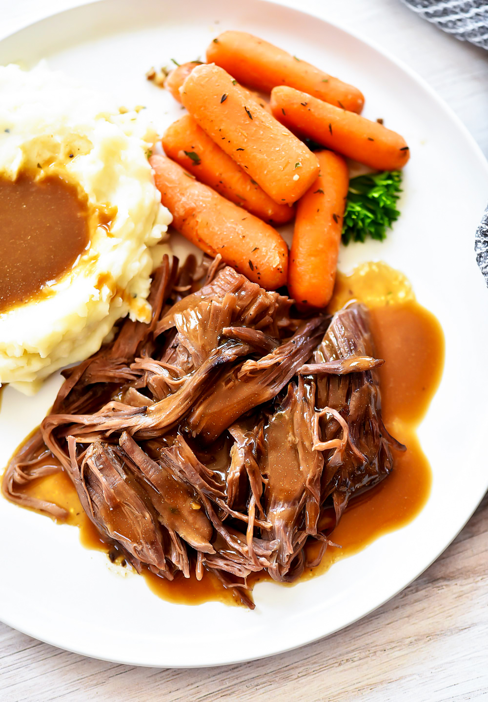 Three Packet Roast is a flavorful slow cooked roast that only requires a packet of Brown gravy mix, Italian Seasoning and Ranch dressing mix. Life-in-the-Lofthouse.com