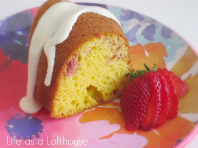 Lemon Berry Bundt Cake with Icing on a plate