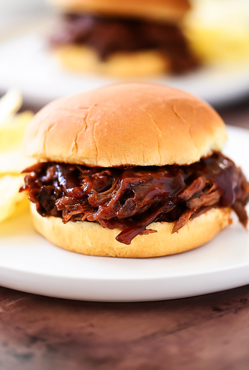 Sweet BBQ Beef sandwiches are delicious shredded beef with a sweet and savor BBQ flavor stuffed between two hamburger buns.