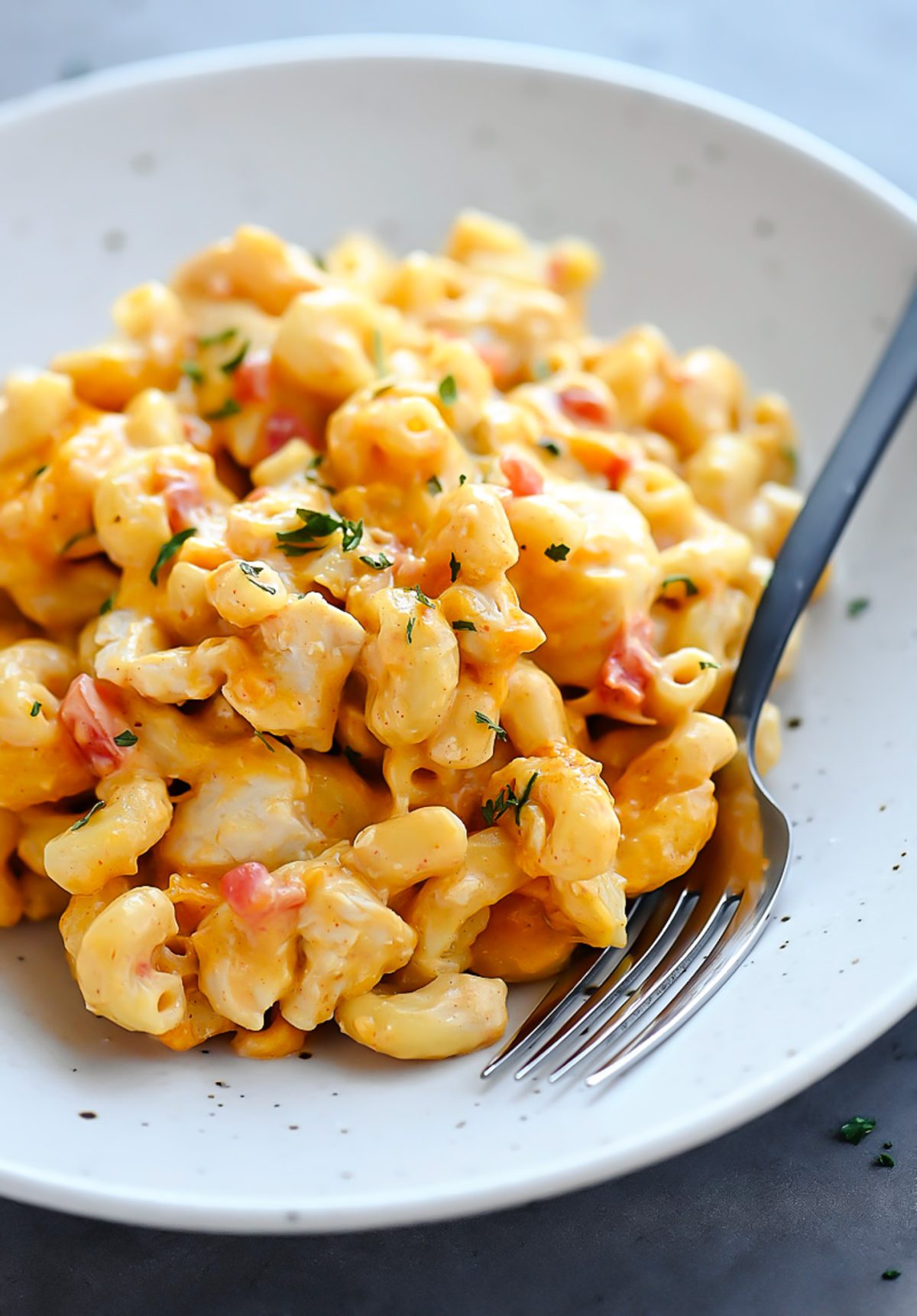 This Mac and Cheese is loaded with chicken, tomatoes, green chilies and more!
