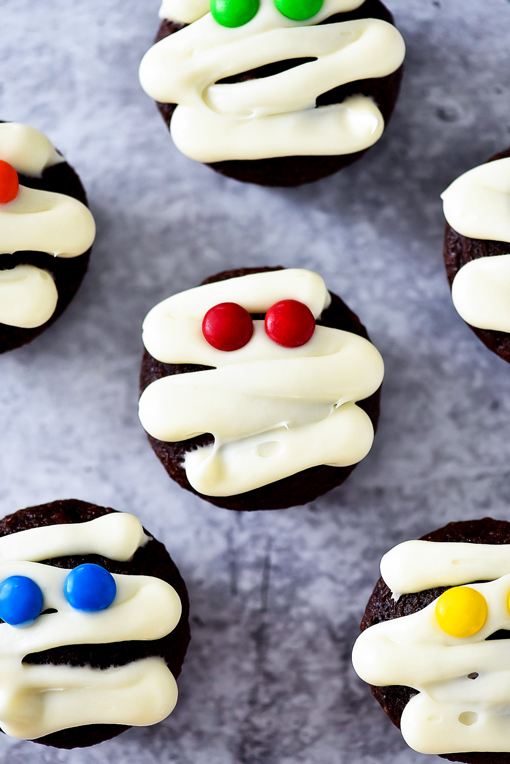 Mummy Cupcakes are delicious chocolate cupcakes decorated to look like mummies. Life-in-the-Lofthouse.com