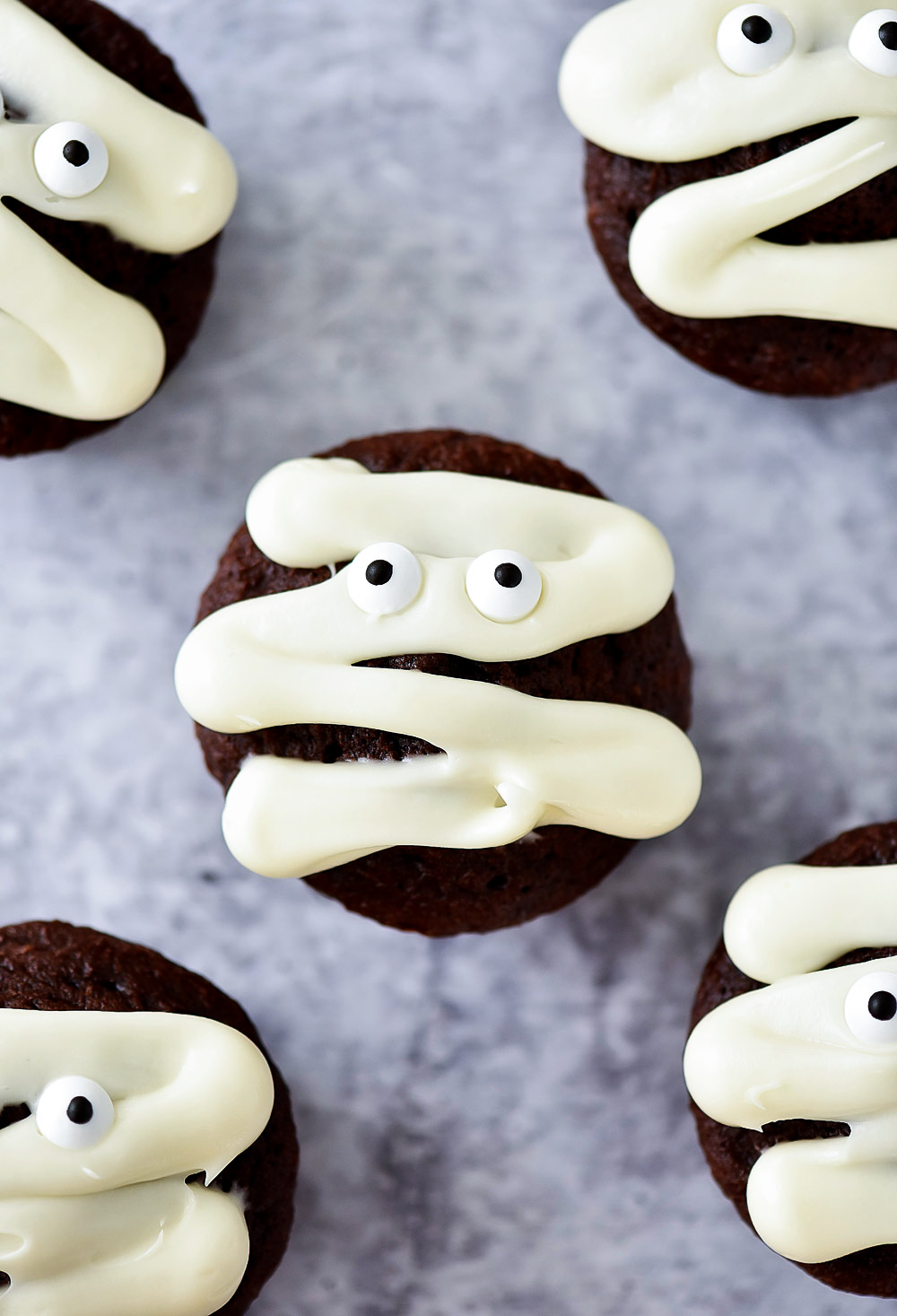 Mummy Cupcakes are delicious chocolate cupcakes decorated to look like mummies. Life-in-the-Lofthouse.com