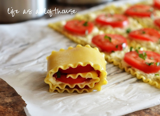 Caprese Lasagna Roll Ups are filled with classic lasagna components like tomato, basil and Mozzarella cheese. Life-in-the-Lofthouse.com