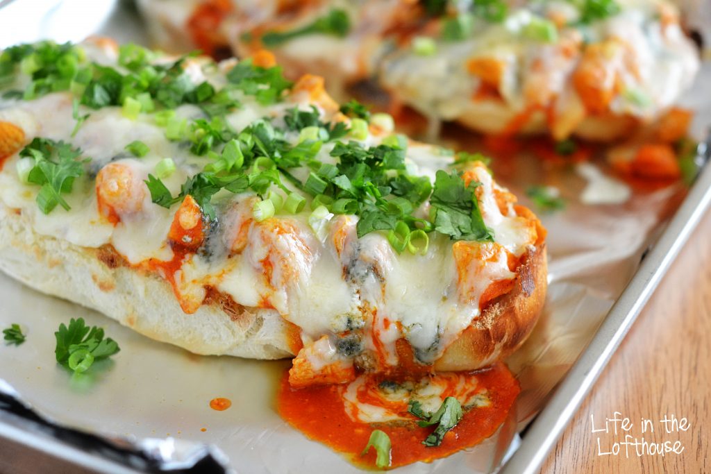 Buffalo Chicken French Bread Pizza is&nbsp;loaded with grilled chicken, garlic, ranch dressing and buffalo wing sauce and topped off with&nbsp;mounds of gooey cheese. Life-in-the-Lofthouse.com