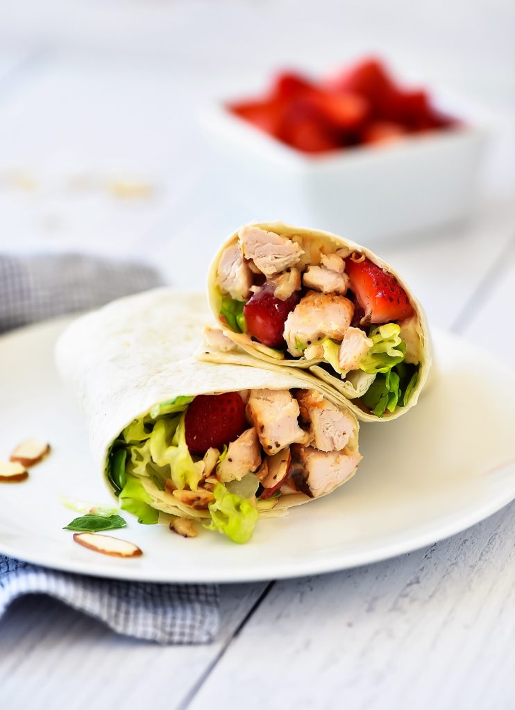 Strawberry Chicken Wraps are filled with grilled chicken, romaine lettuce, creamy poppy seed dressing and strawberries. Life-in-the-Lofthouse.com