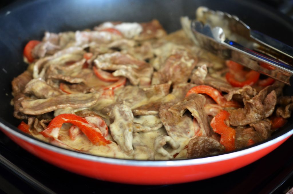 Think steak, cheese and bell peppers tossed in creamy Rag&ugrave;&reg; Cheese Creations Classic Alfredo Sauce baked on French bread make up this Italian cheese steak french bread pizza. Life-in-the-Lofthouse.com