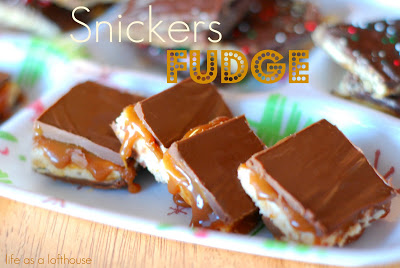 Indulge in Snickers Fudge: layers of chocolate, peanut butter, caramel, marshmallow, and peanuts for a rich, irresistible treat!