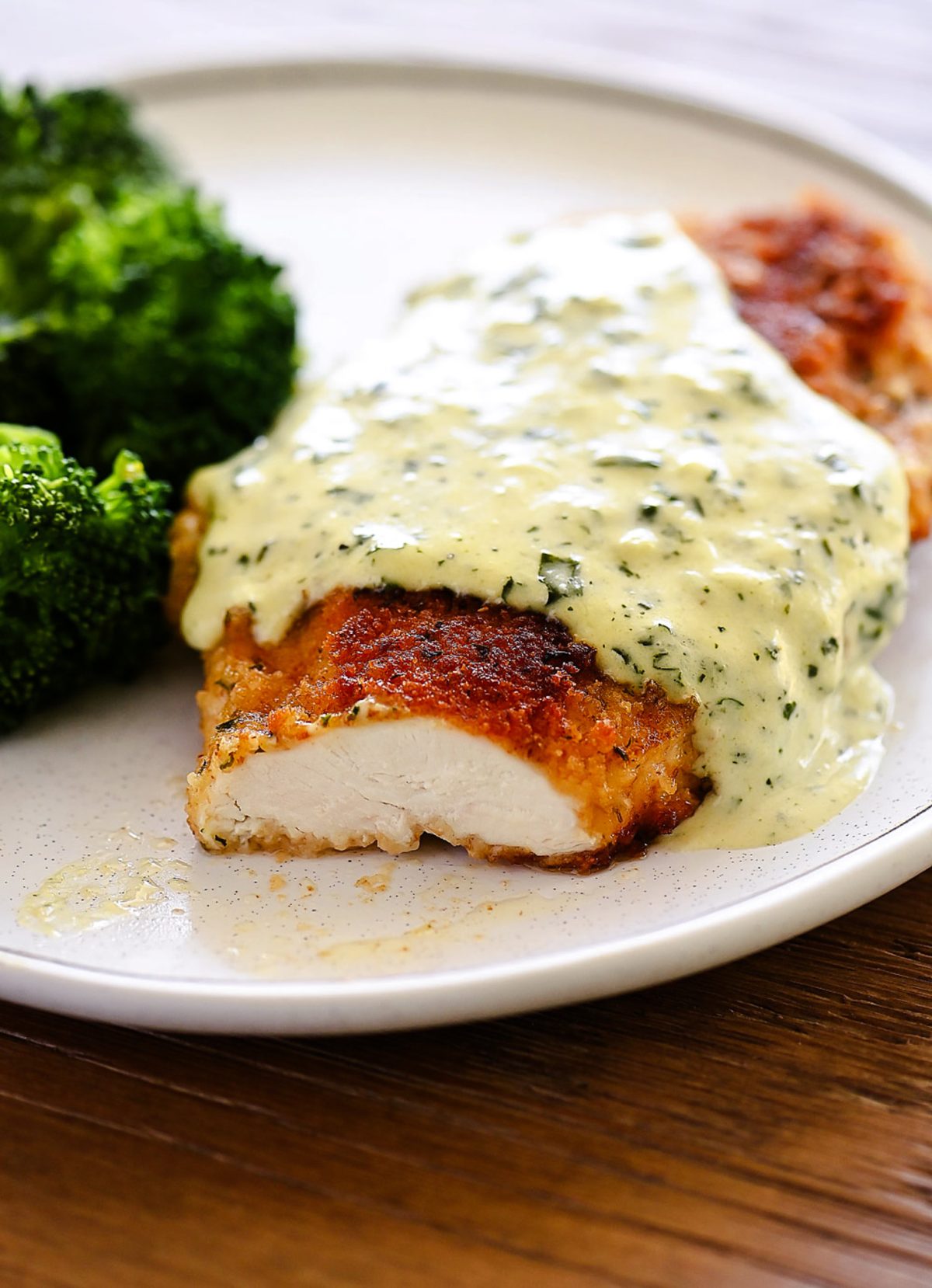 Chicken smothered in Basil Cream Sauce