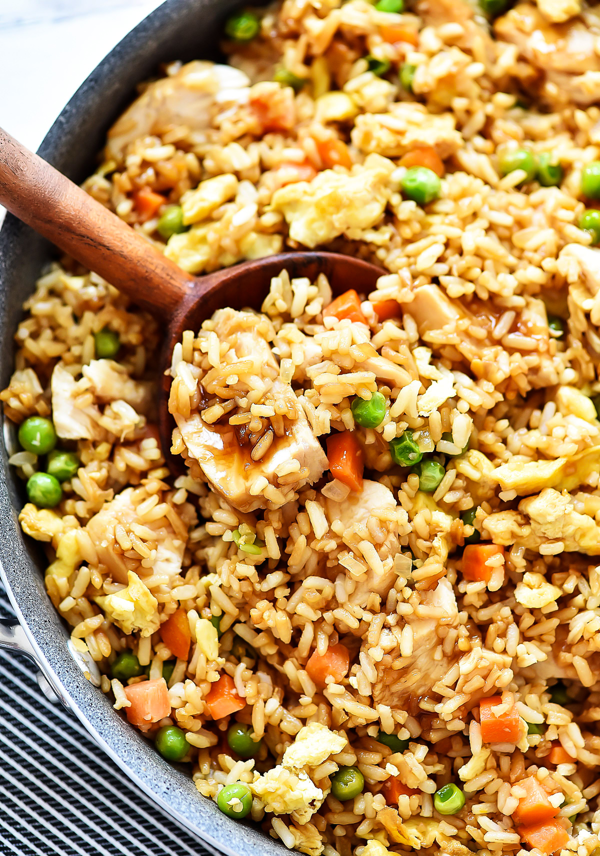 Chicken fried rice has all the classic elements of fried rice with teriyaki chicken through out. Life-in-the-Lofthouse.com