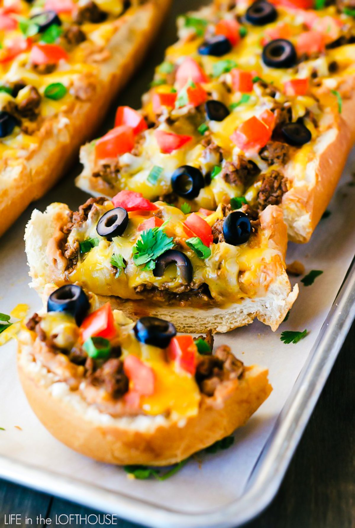 Taco French bread pizza has all the flavors of a taco transformed into a pizza using french bread. Life-in-the-Lofthouse.com