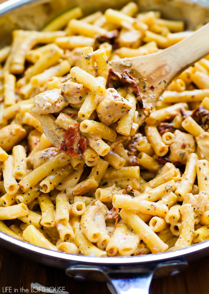 Chicken Mozzarella pasta with sun-dried tomatoes is a delicious pasta salad full of Italian flavor. Life-in-the-Lofthouse.com