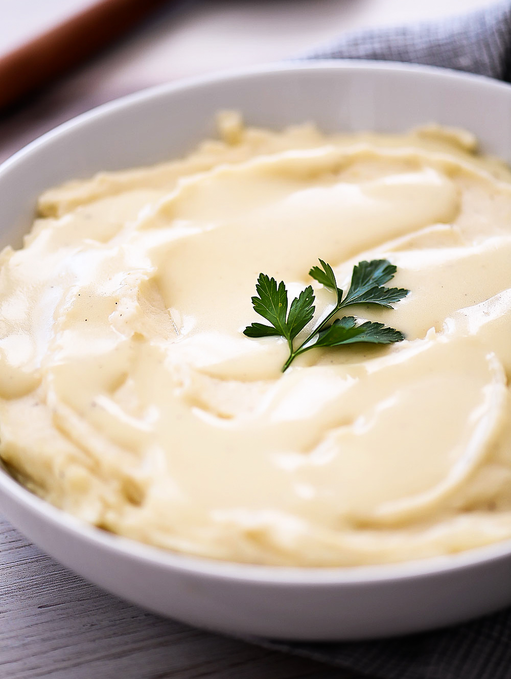 Creamy Parmesan mashed potatoes with perfect garlic flavor. Life-in-the-Lofthouse.com
