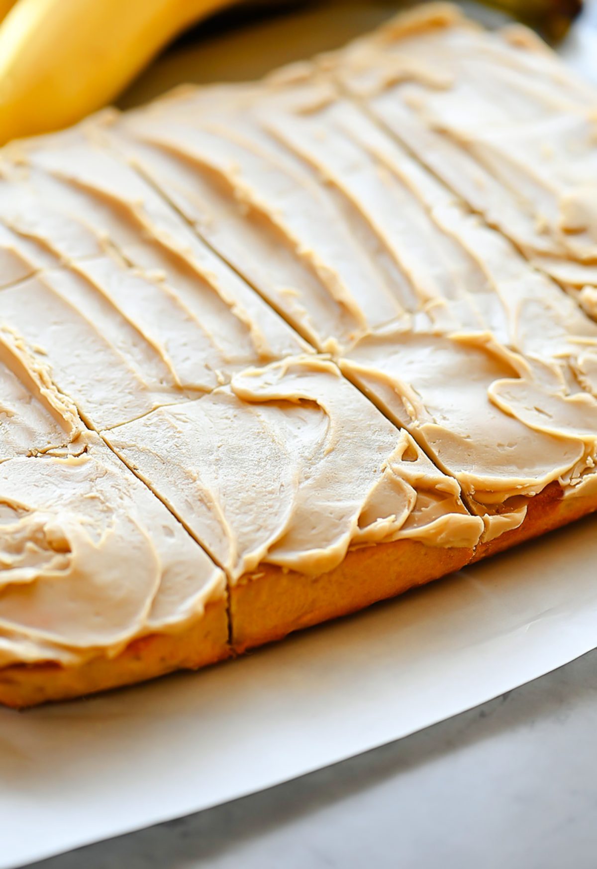 Banana blondies are a sweet and delicious dessert with banana flavor and a rich browned butter frosting. Life-in-the-Lofthouse.com