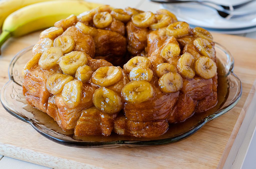 Banana bread monkey bread is warm pull-apart bread oozing with caramel, cinnamon and a hint of banana bread flavor. Life-in-the-Lofthouse.com