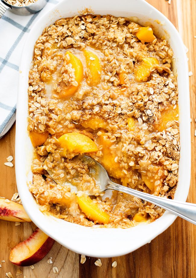 Peach Crisp starts with a bottom layer of flaky, buttery pastry and sweet peach filling and is then covered in a crumbly oatmeal streusel topping. Life-in-the-Lofthouse.com