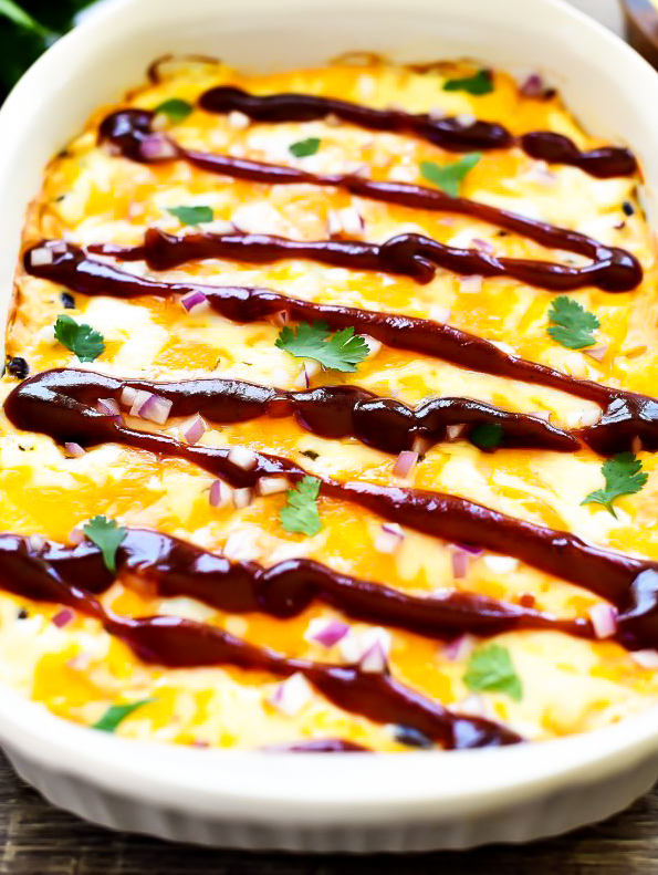 A delicious dip filled with chopped chicken, BBQ sauce, cream cheese, beans and corn. Life-in-the-Lofthouse.com
