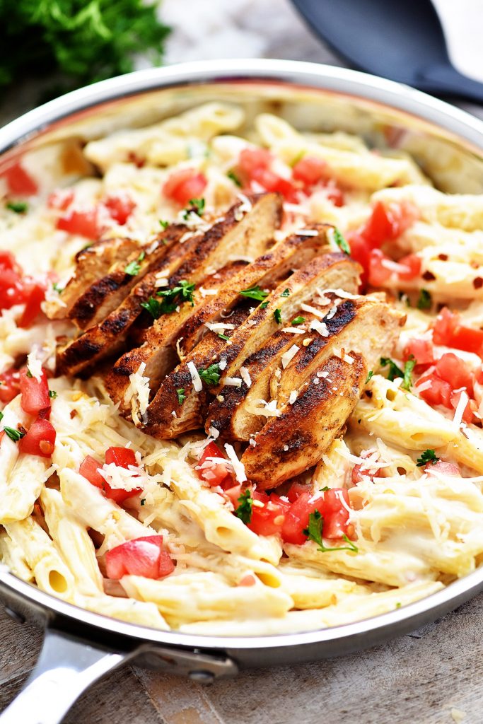 Cajun chicken, homemade alfredo and penne pasta all in this comfort dish!