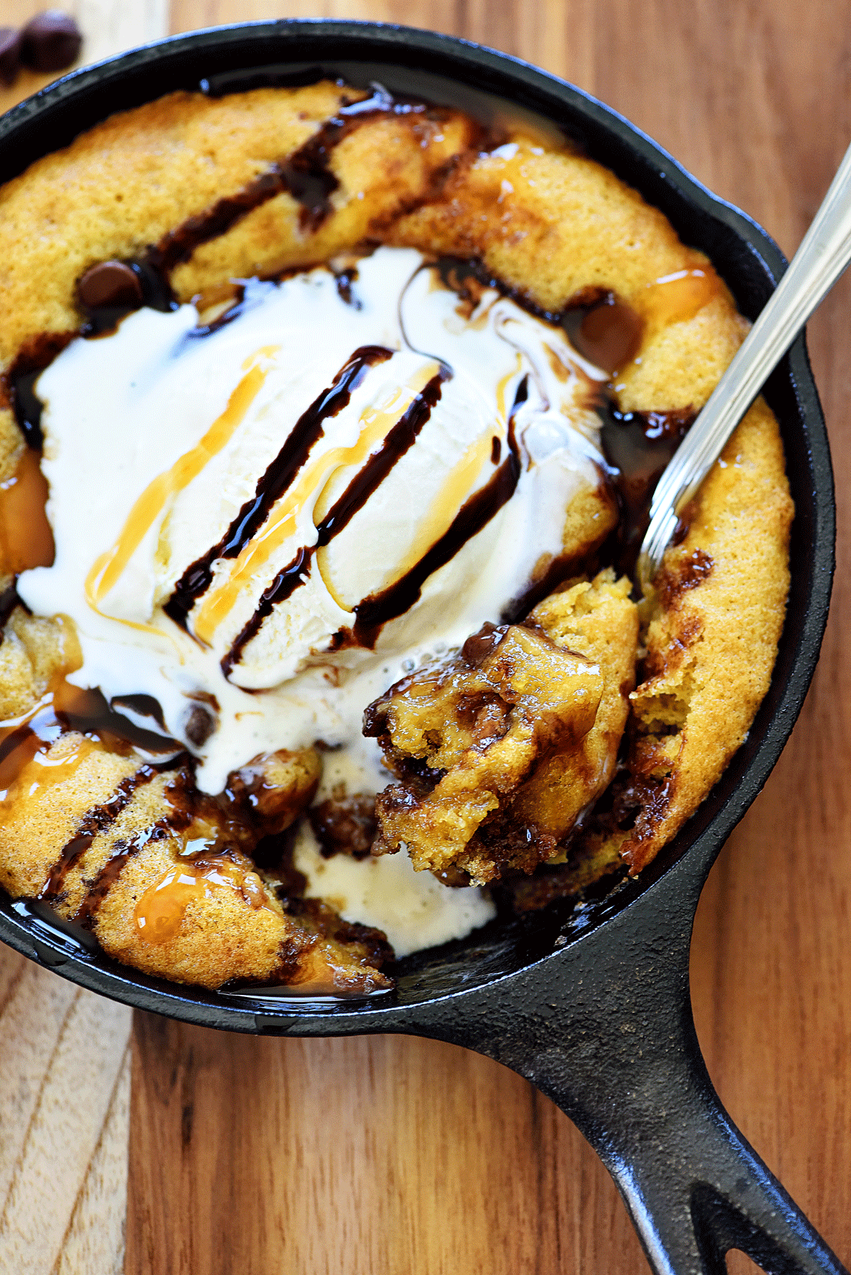 Chocolate chip skillet cookie is a warm, gooey chocolate chip cookie baked in a mini skillet. Life-in-the-Lofthouse.com