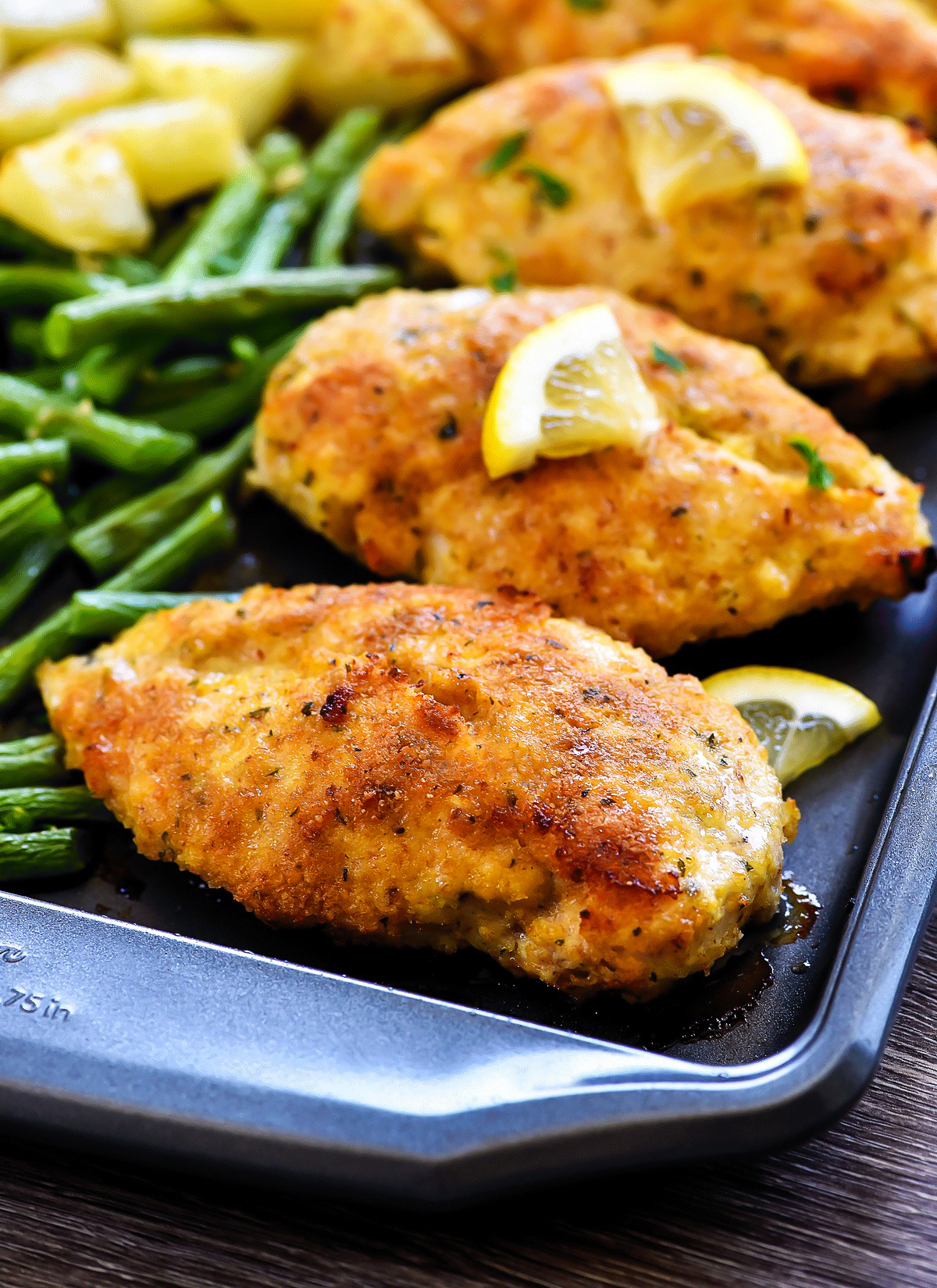 Crispy Chicken and veggies with lemon and garlic flavor all cooked on one pan. Life-in-the-Lofthouse.com