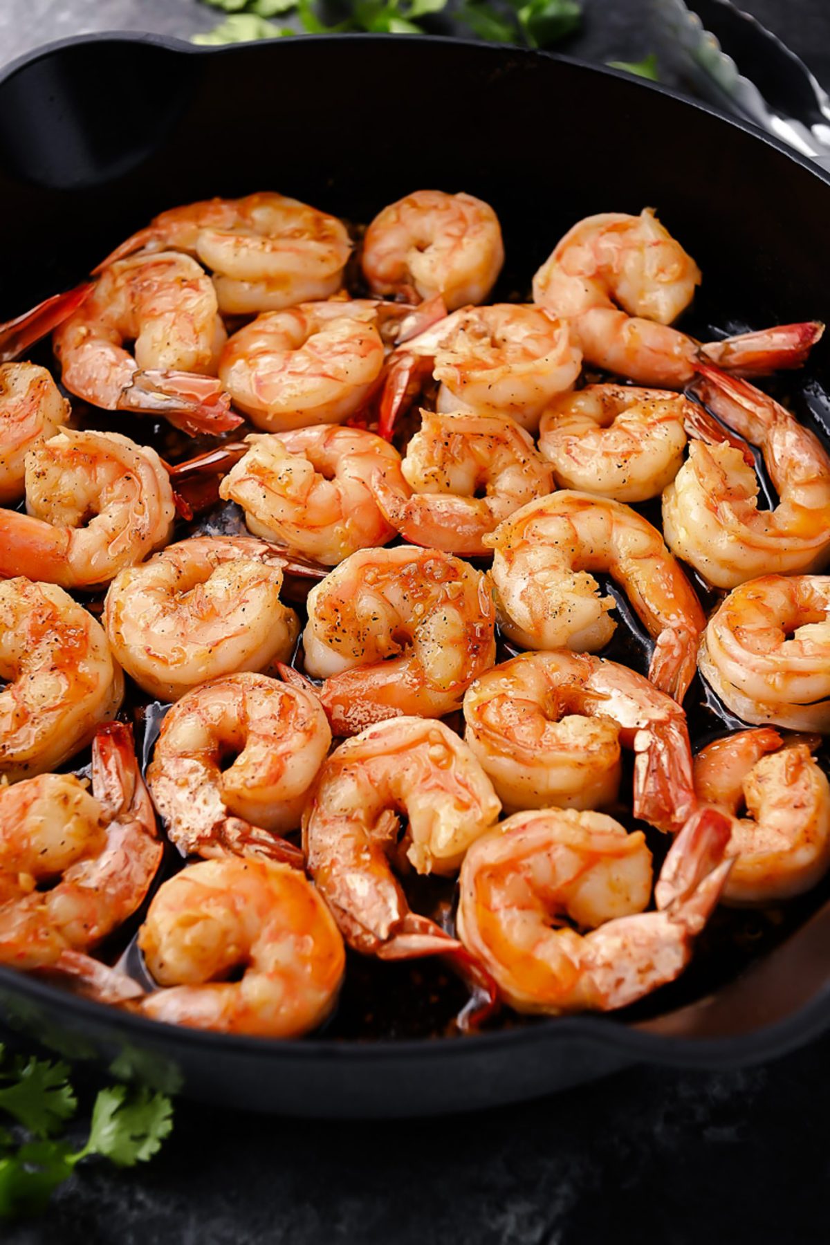 Hawaiian-style garlic shrimp: juicy, seasoned shrimp sizzling to perfection, inspired by the North Shore, offering a flavorful taste of the islands.