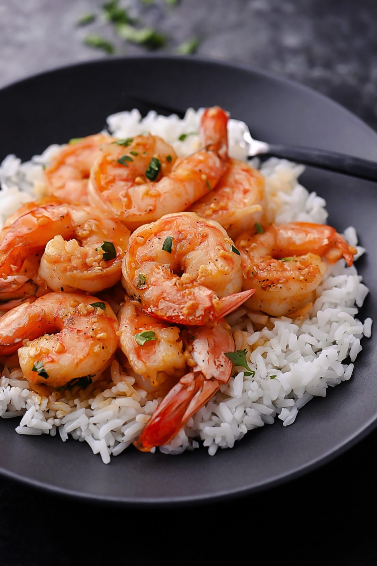 Hawaiian-style garlic shrimp: juicy, seasoned shrimp sizzling to perfection, inspired by the North Shore, offering a flavorful taste of the islands.