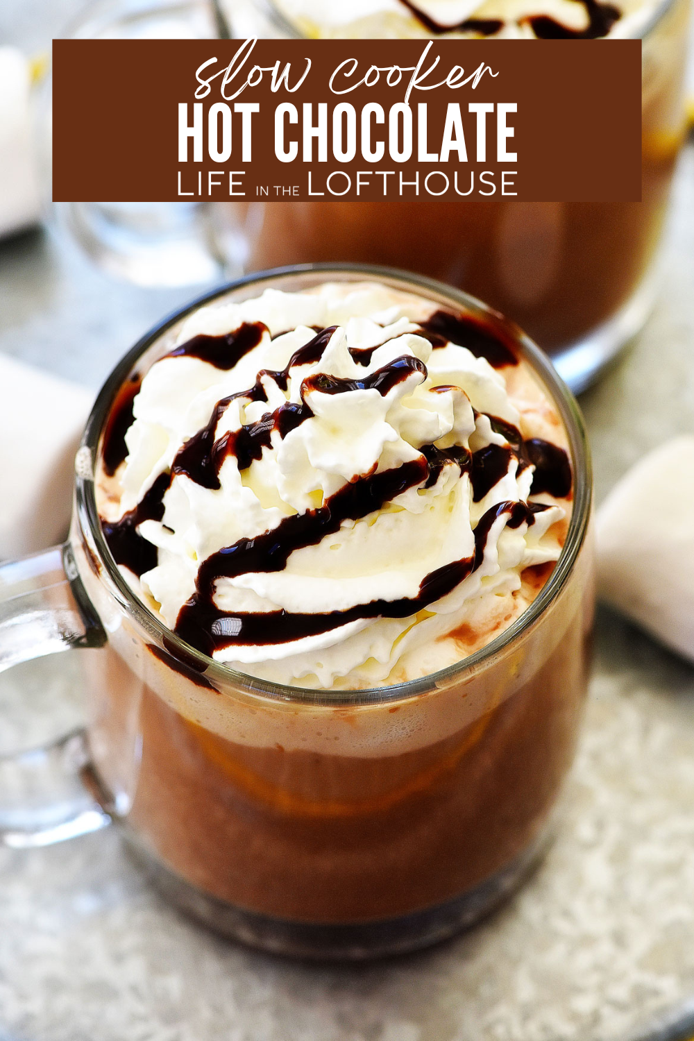 Slow Cooker Hot Chocolate made with cocoa powder, sweetened condensed milk, and vanilla.