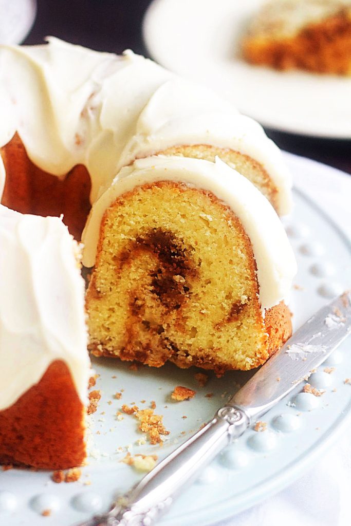 Sour Cream Coffee Cake with Browned Butter Glaze is a delicious cake with cinnamon streusel swirled throughout that is topped with a browned butter glaze. Life-in-the-Lofthouse.com
