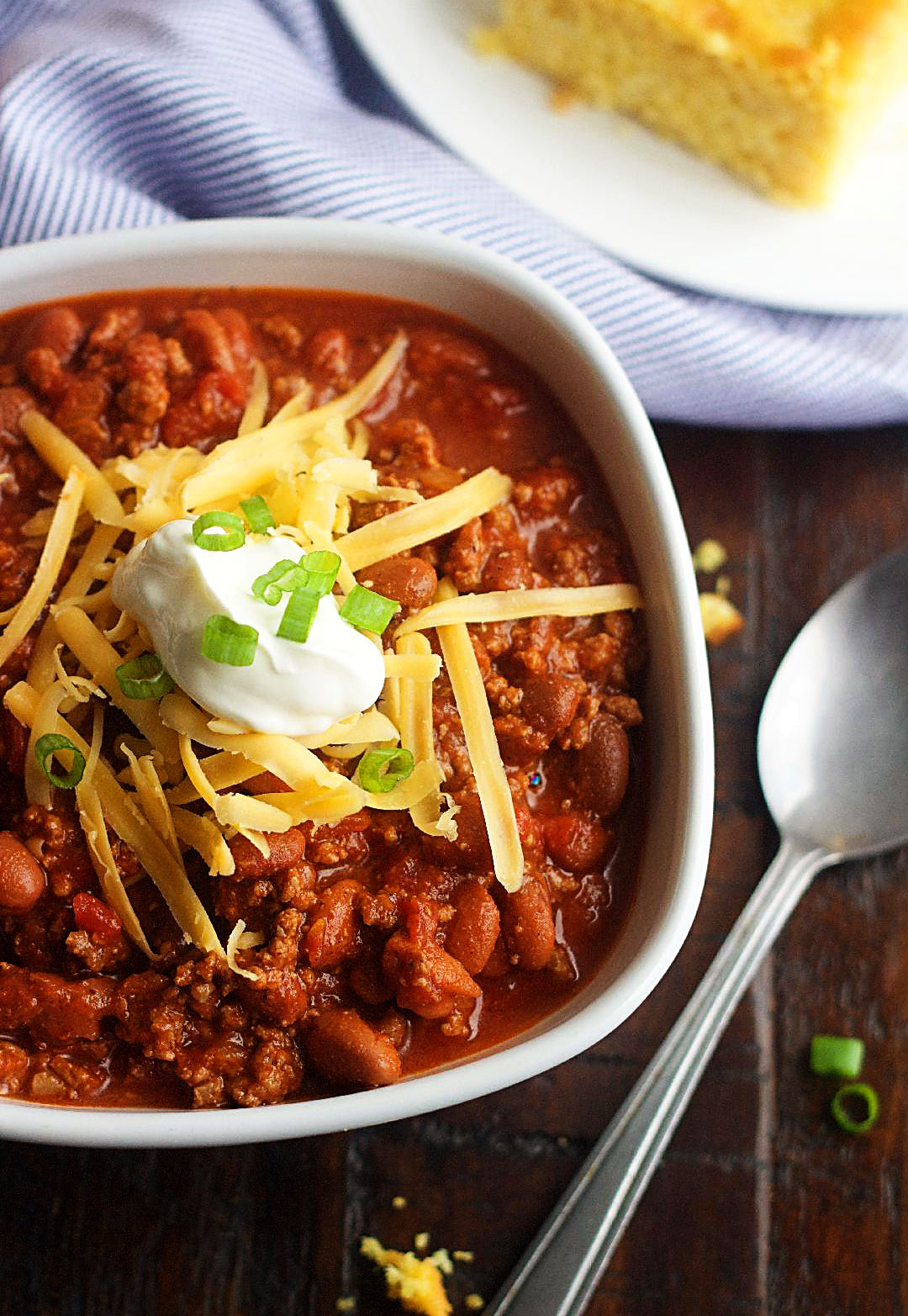 This Chili is full of ground beef, chili beans, tomatoes and onion all cooked up in a slow cooker. Life-in-the-Lofthouse.com