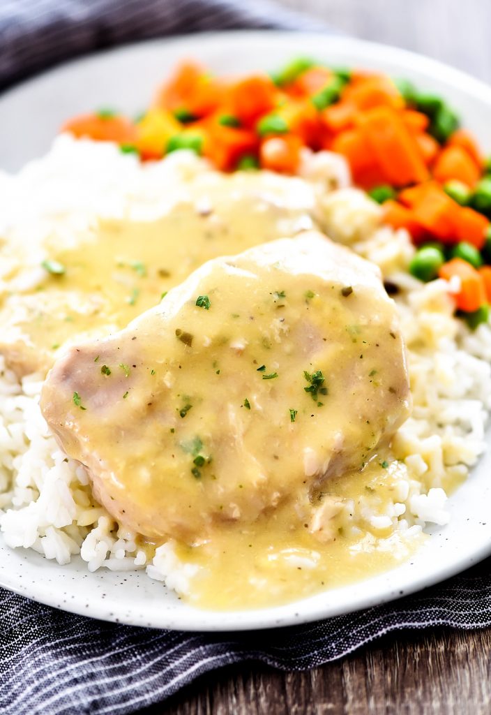 Creamy Ranch Pork chops are slow cooked with chicken and mushroom soups and ranch seasoning. Life-in-the-Lofthouse.com