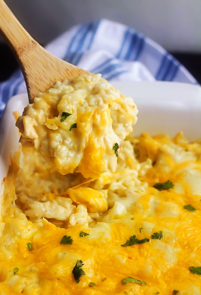 Green Chile Chicken Enchilada Casserole is loaded with chicken, sour cream, cheese, rice and green enchilada sauce. Life-in-the-Lofthouse.com