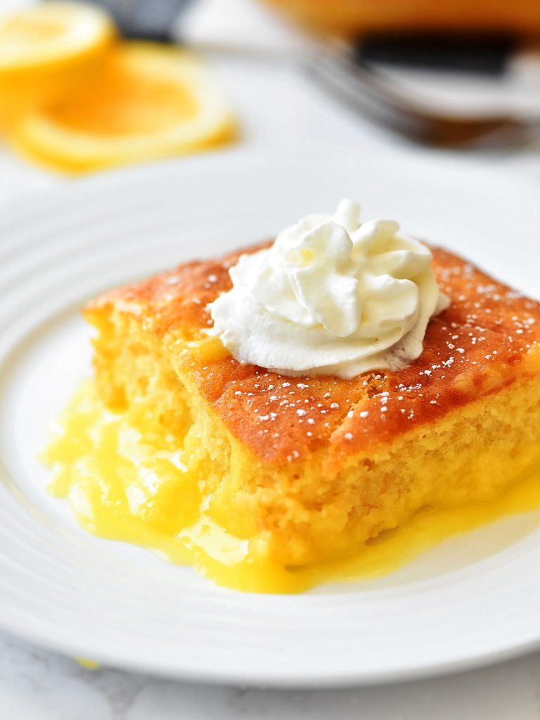 Lemon Pudding Cake is a moist, light and fluffy yellow cake that bakes over the top of creamy lemon pudding. Life-in-the-Lofthouse.com