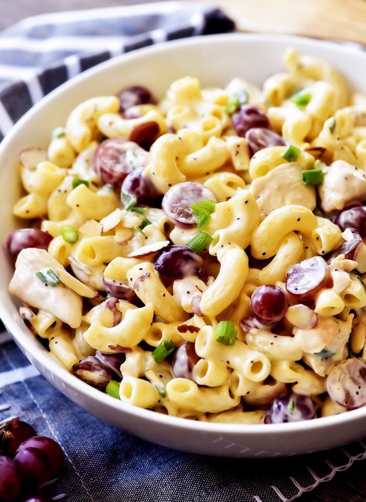 Poppy Seed Chicken Grape Pasta Salad is a pasta salad filled with seasoned chicken, pasta, grapes, green onion and covered in poppy seed dressing. Life-in-the-Lofthouse.com