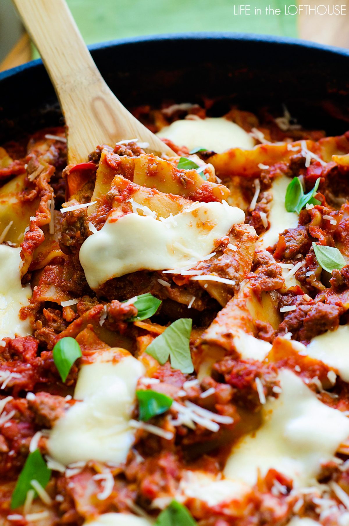 Easy Skillet Lasagna is a delicious lasagna made in just one skillet with ricotta and mozzarella cheese and fresh basil. Life-in-the-Lofthouse.com