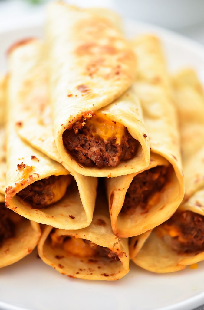 Crisp Bean Burritos are filled with cheesy refried beans all wrapped inside a flour tortilla then deep-fried. Life-in-the-Lofthouse.com