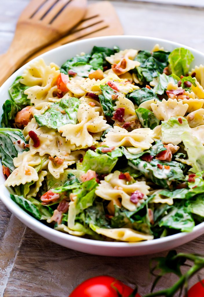BLT Pasta Salad is filled with bacon, lettuce and tomato. It also includes pasta all covered in a creamy ranch dressing. Life-in-the-Lofthouse.com