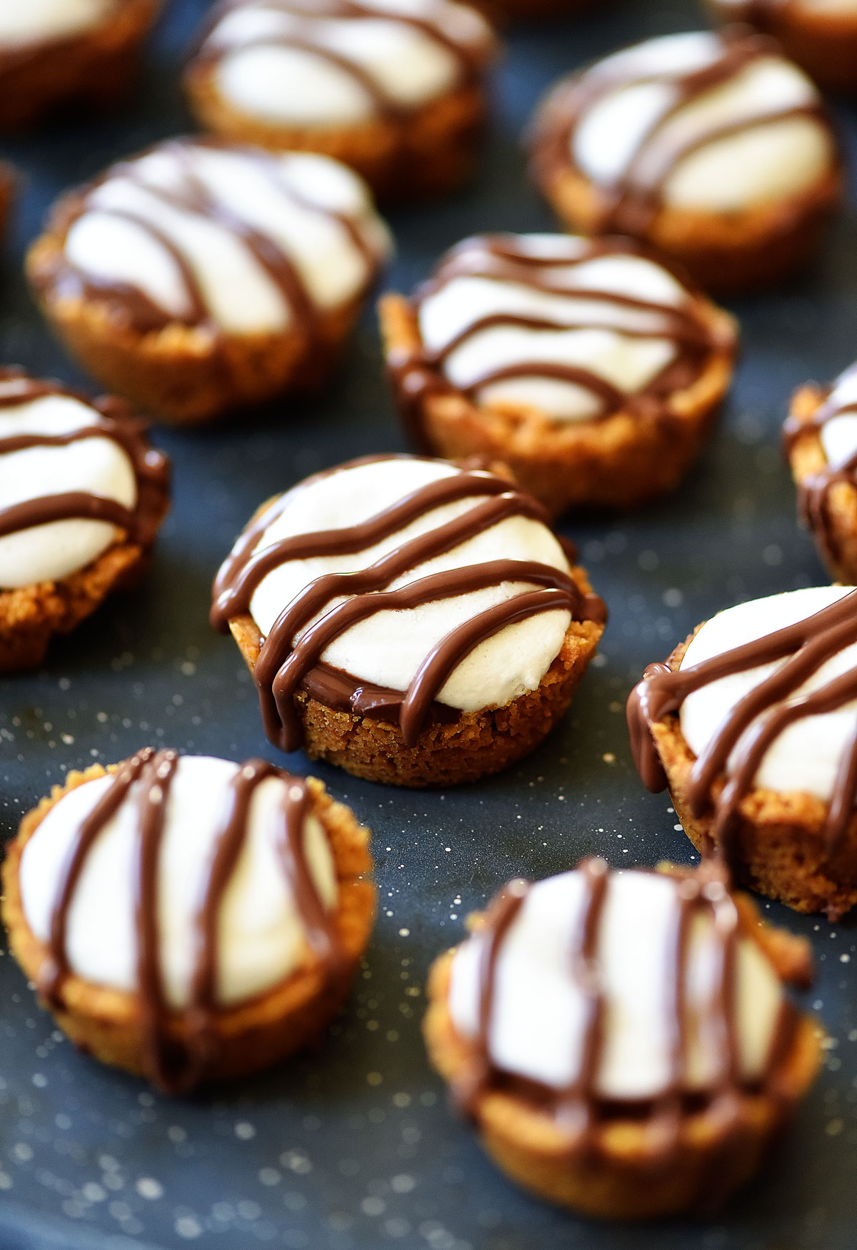 S'mores Cups are delicious graham cracker crusts filled with marshmallow and chocolate. Life-in-the-Lofthouse.com