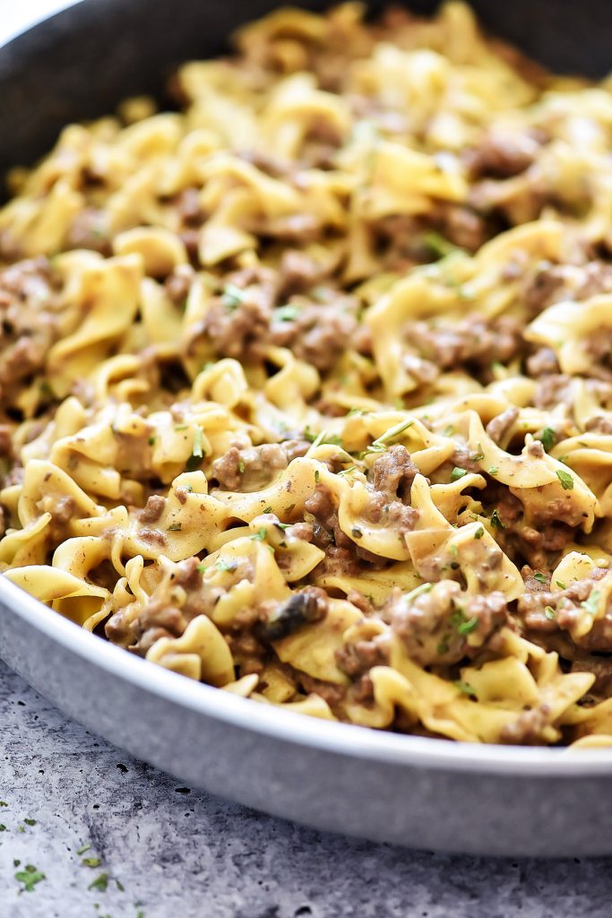 Easy Beef Stroganoff is filled with ground beef and a mushroom sauce served over egg noodles. Life-in-the-Lofthouse.com