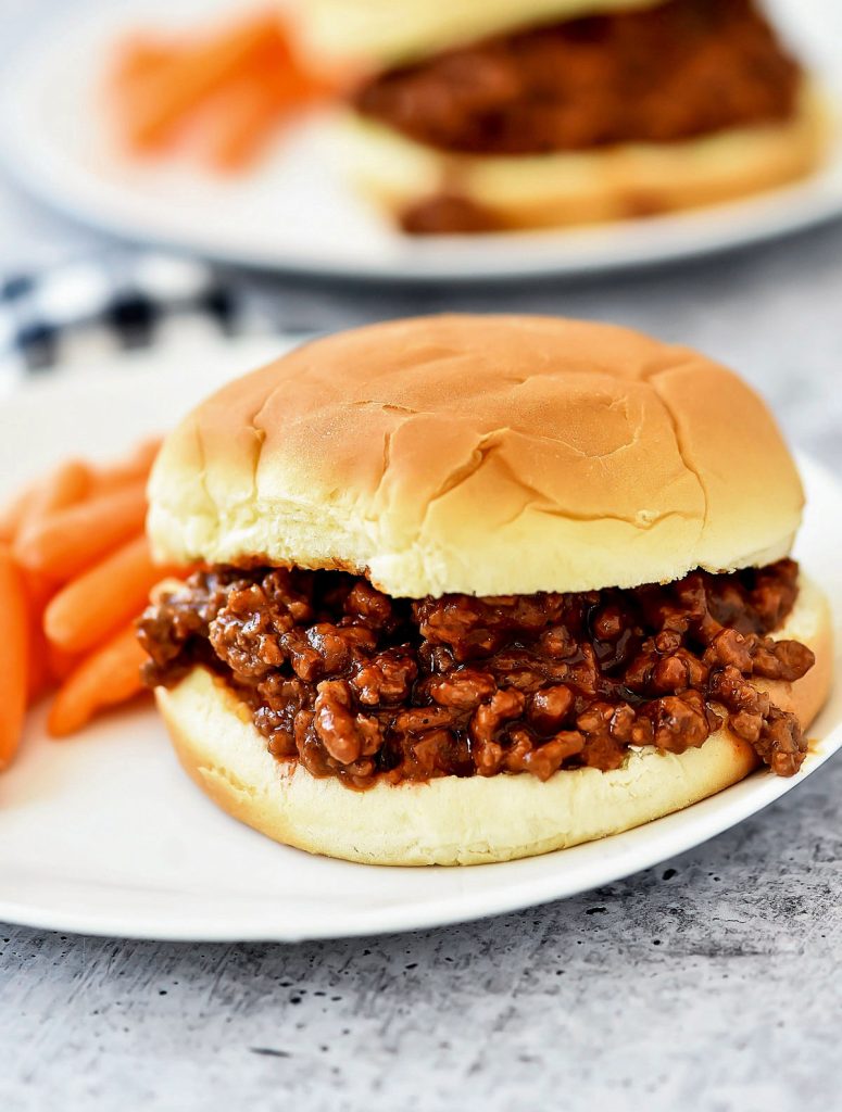 Sloppy Joes start with a homemade beef mixture that is packed with flavor and stuffed between a hamburger bun. Life-in-the-Lofthouse.com