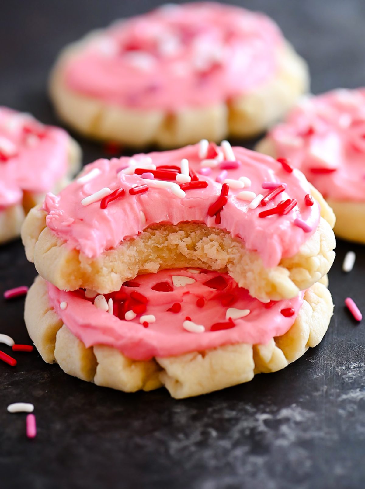 Soft and delicious sugar cookies with a creamy pink frosting. Life-in-the-Lofthouse.com