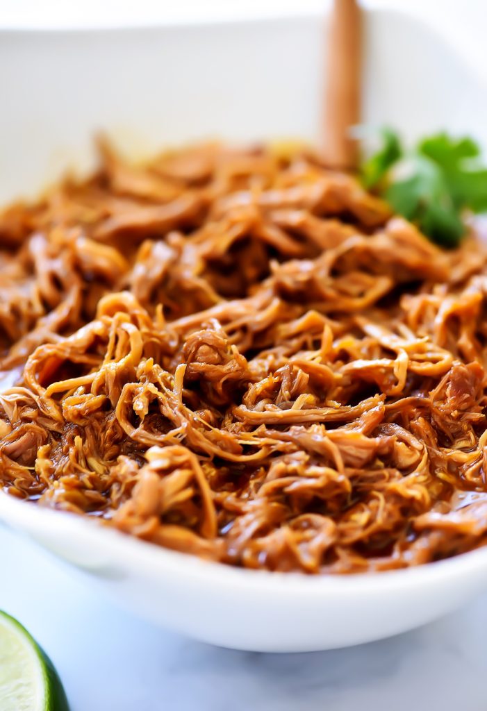 Slow Cooker Sweet Pork is delicious sweet pork given its flavor from brown sugar, red enchilada sauce and diced green chilies. Life-in-the-Lofthouse.com