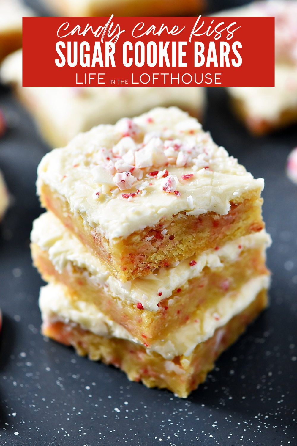 stacked Candy Cane Kiss Sugar Cookie Bars with crushed candy cane topping