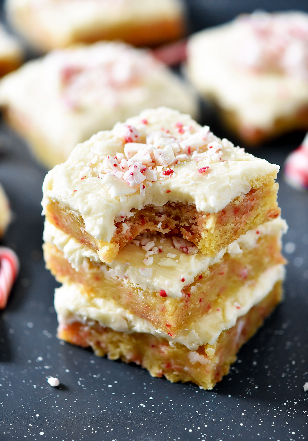Delicious, soft sugar cookie bars filled and topped with candy cane Hershey kisses. Life-in-the-Lofthouse.com