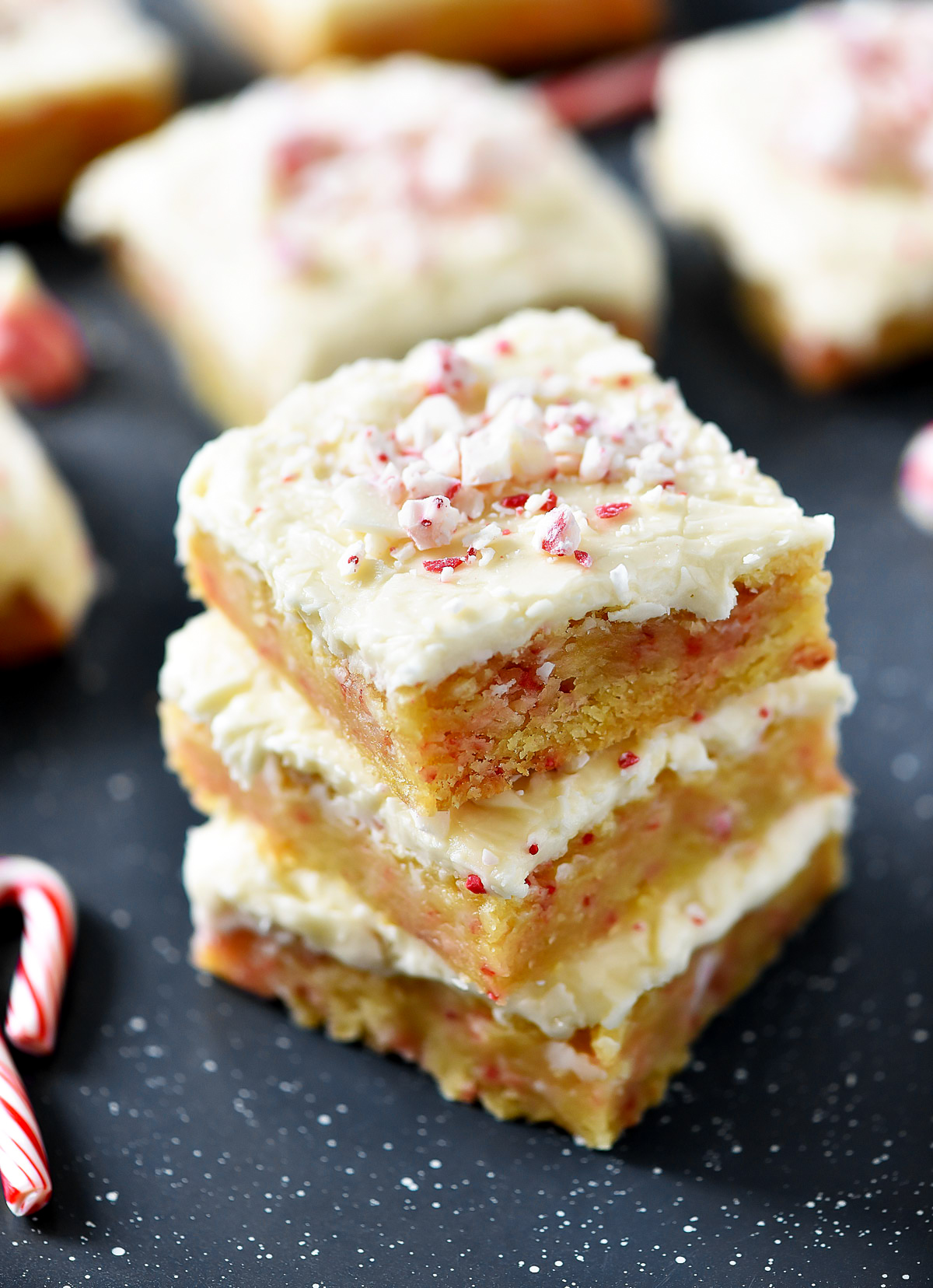Delicious, soft sugar cookie bars filled and topped with candy cane Hershey kisses. Life-in-the-Lofthouse.com