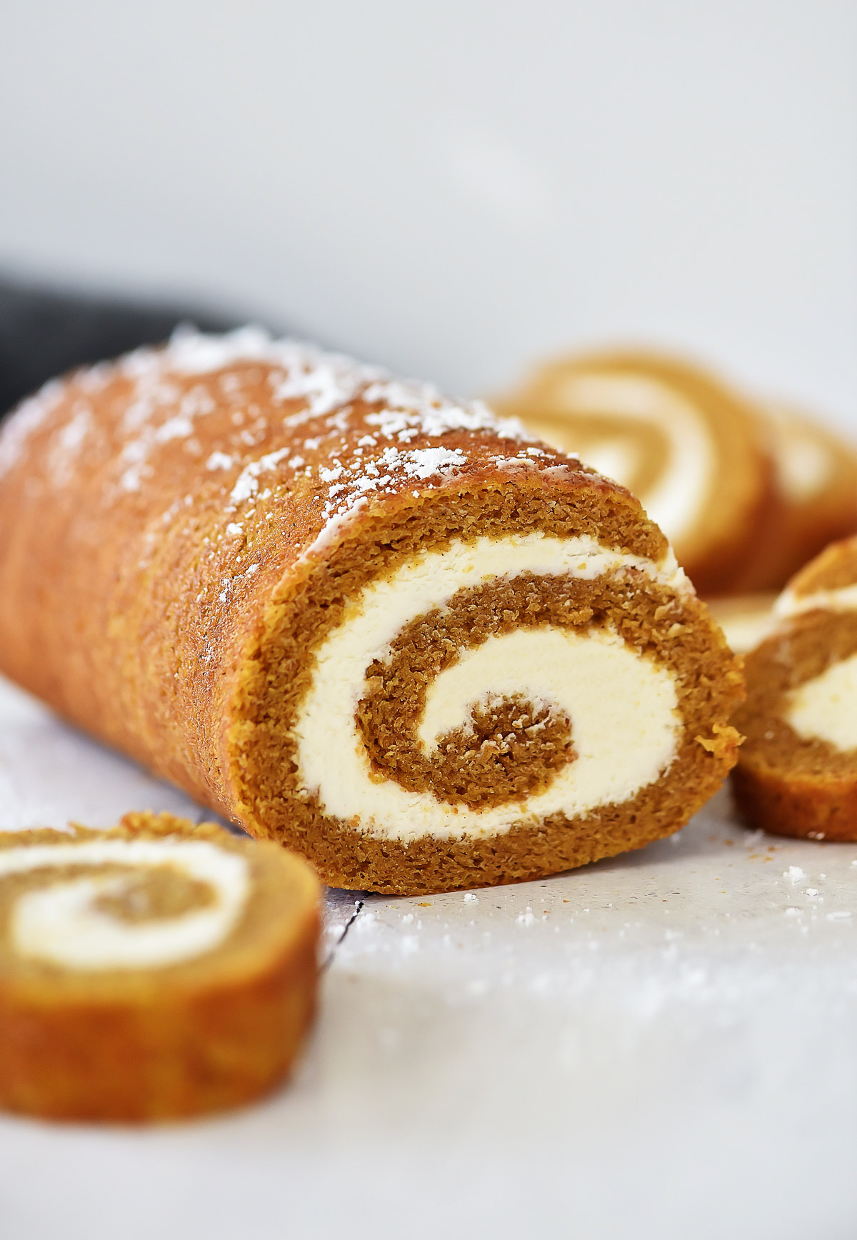 Soft pumpkin cake rolled up and filled with a creamy cream cheese filling. Life-in-the-Lofthouse.com