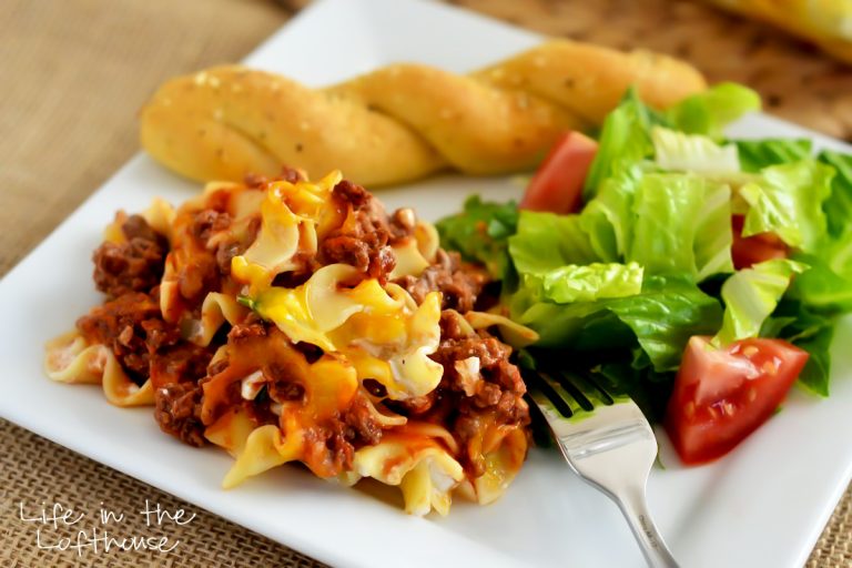 Noodles, ground beef, tomato sauce, sour cream and lots of cheese are all inside this Sour Cream Noodle Bake. Life-in-the-Lofthouse.com