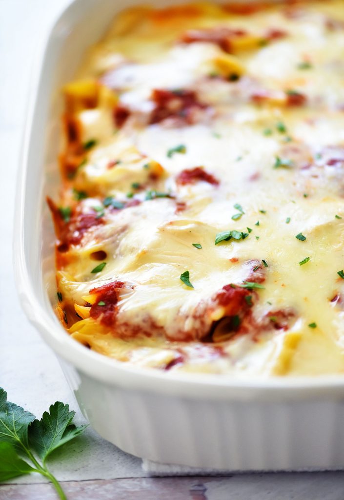 Alfredo and marinara sauces with mozzarella cheese and penne pasta and mozzarella