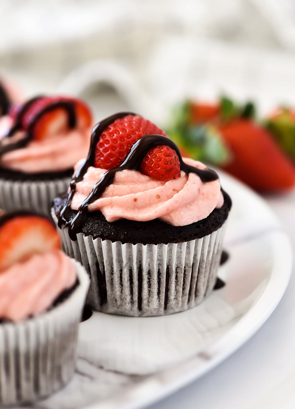 Chocolate Cupcakes topped with fresh strawberry frosting. Life-in-the-Lofthouse.com