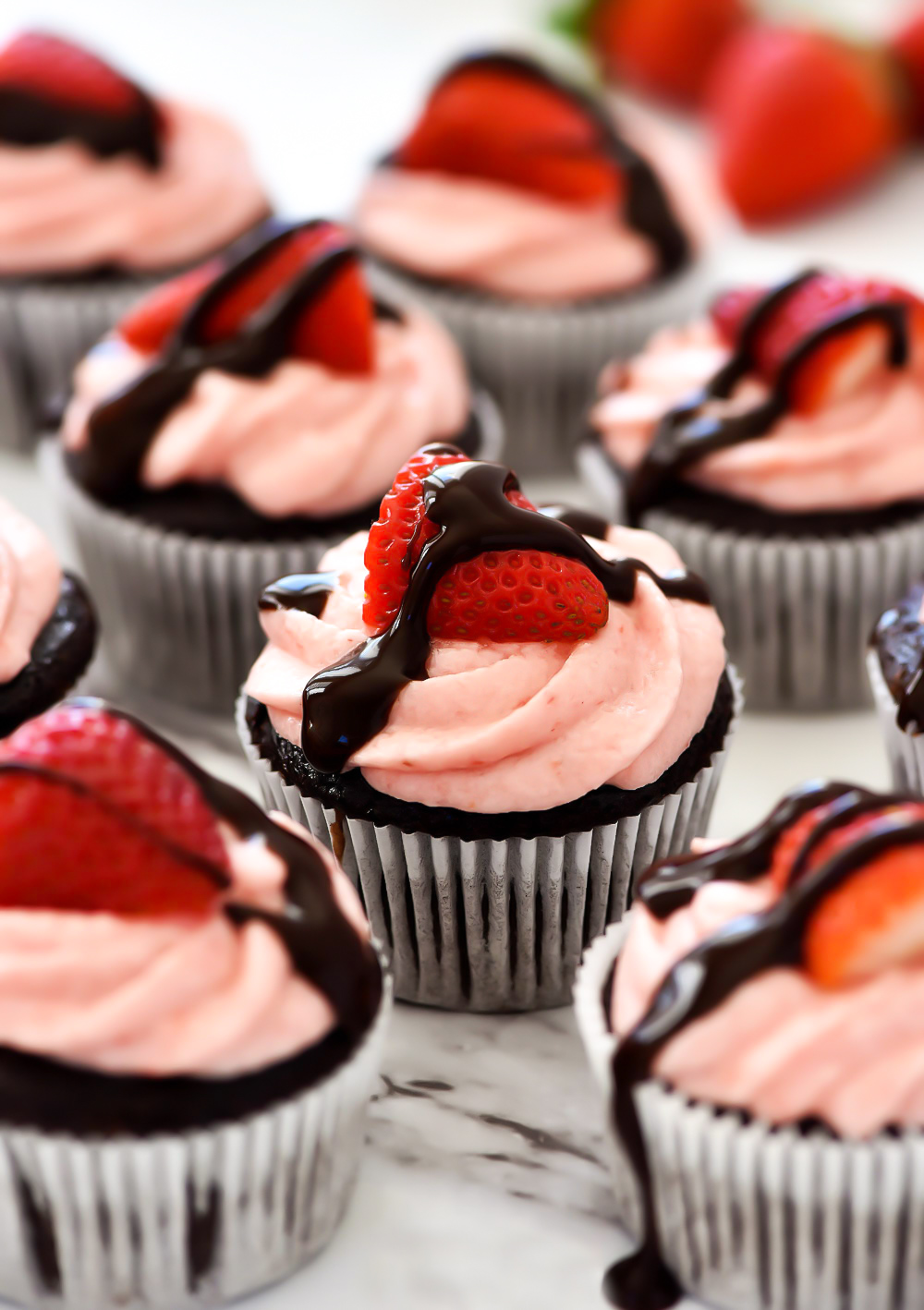 Chocolate Cupcakes topped with fresh strawberry frosting. Life-in-the-Lofthouse.com